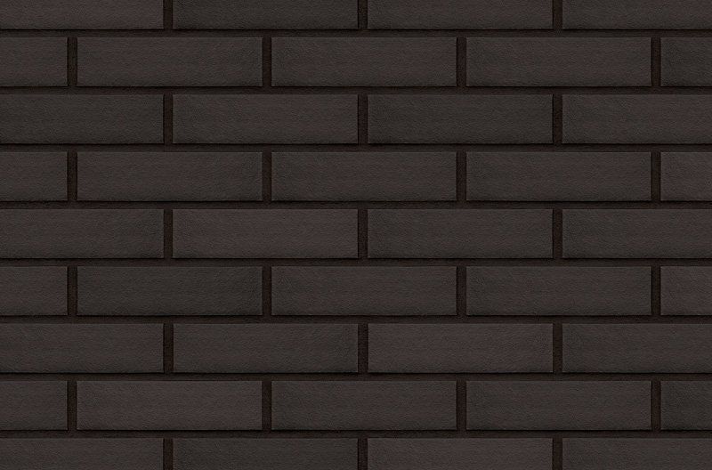 Dark brown brick wall.