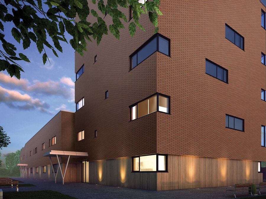 Brown modern building with rectangular and square windows, with a smaller building attached.