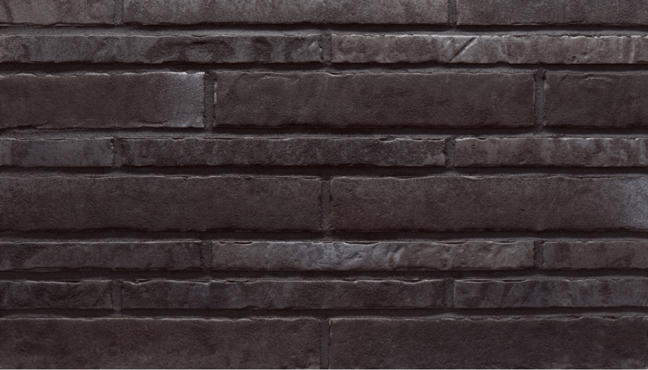 Dark gray brick wall with horizontal rectangular bricks.