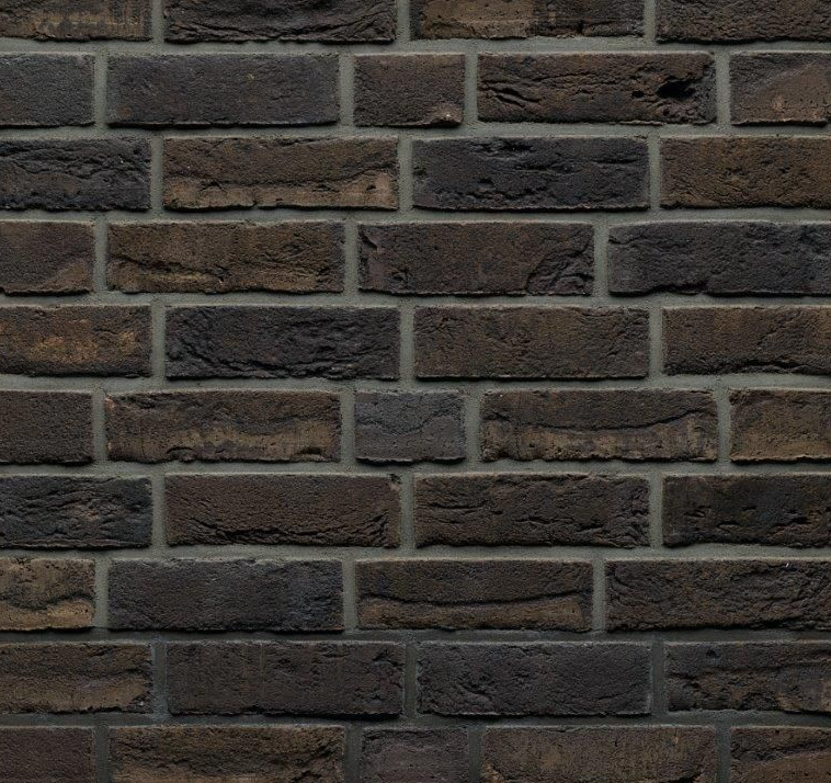 Dark brick wall with gray mortar.