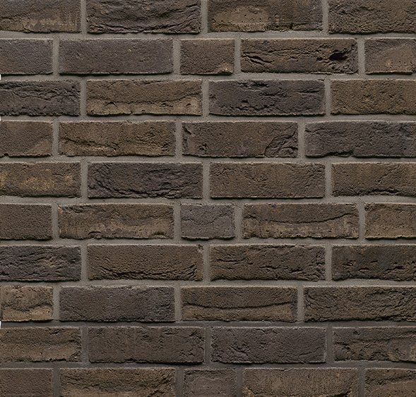 Dark brown brick wall.