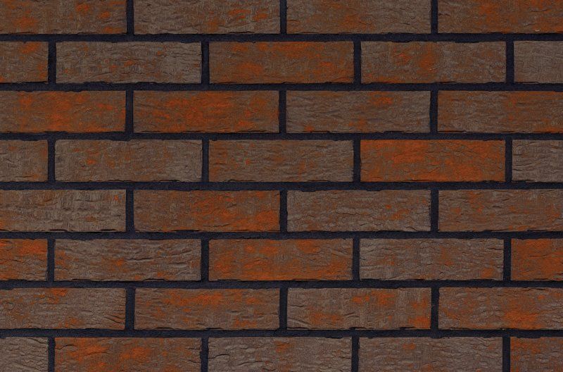 Brick wall with reddish-brown bricks and dark mortar.