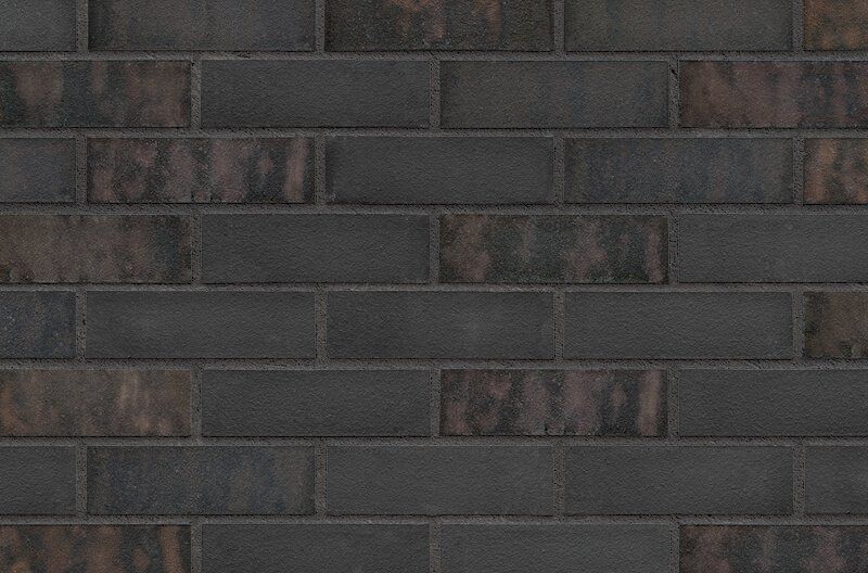 Dark gray and brown brick wall.