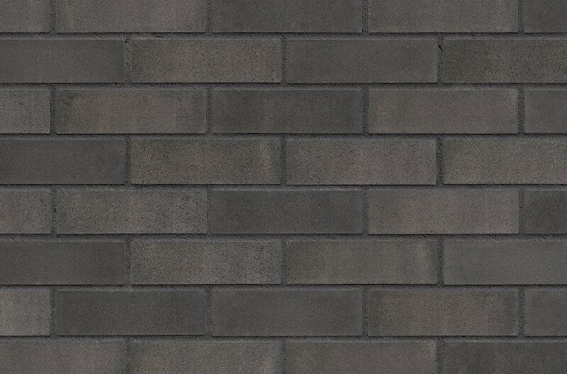 Gray brick wall with dark mortar.