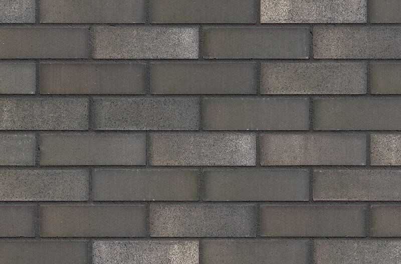 Gray brick wall with alternating brick shades.