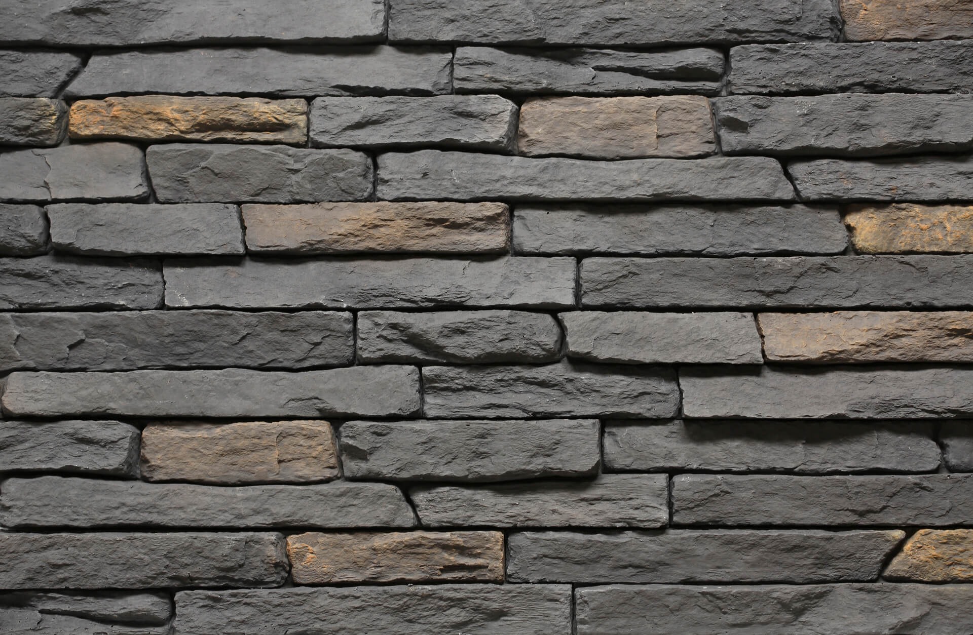 Gray and tan stone wall.