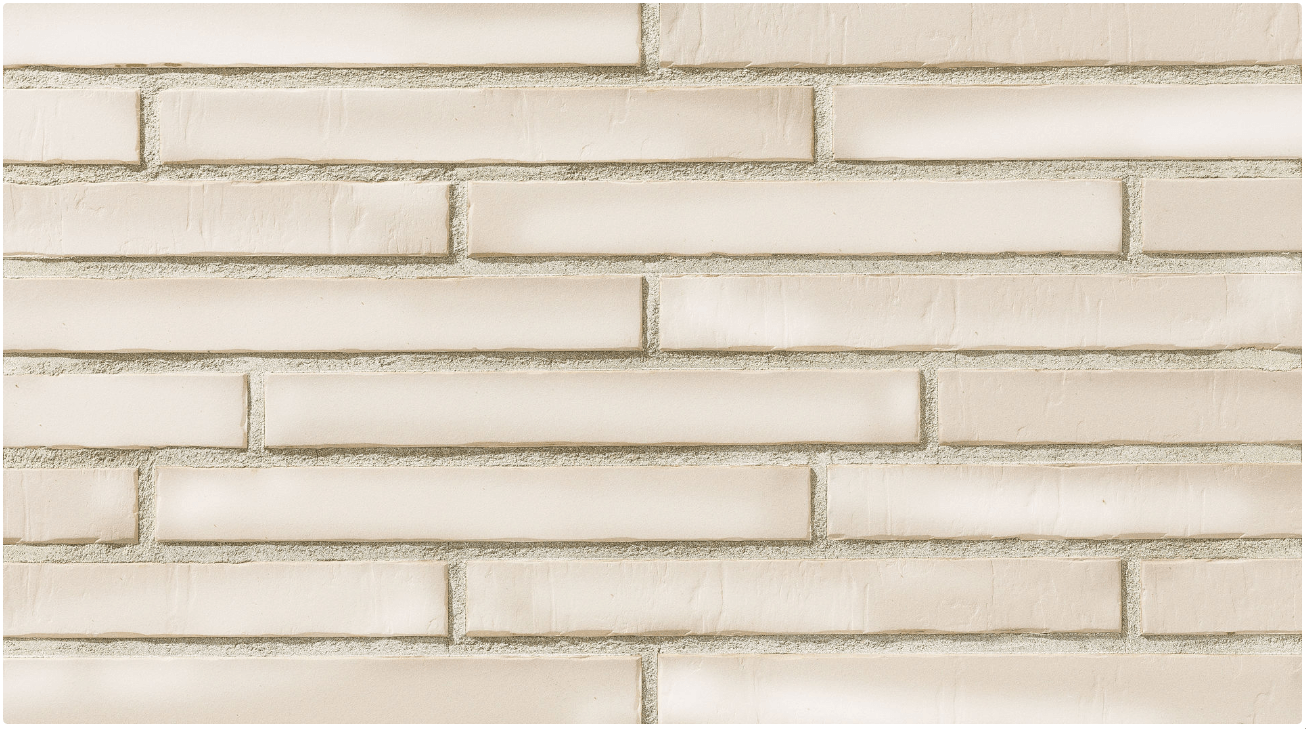 Tan brick wall with horizontal staggered pattern.