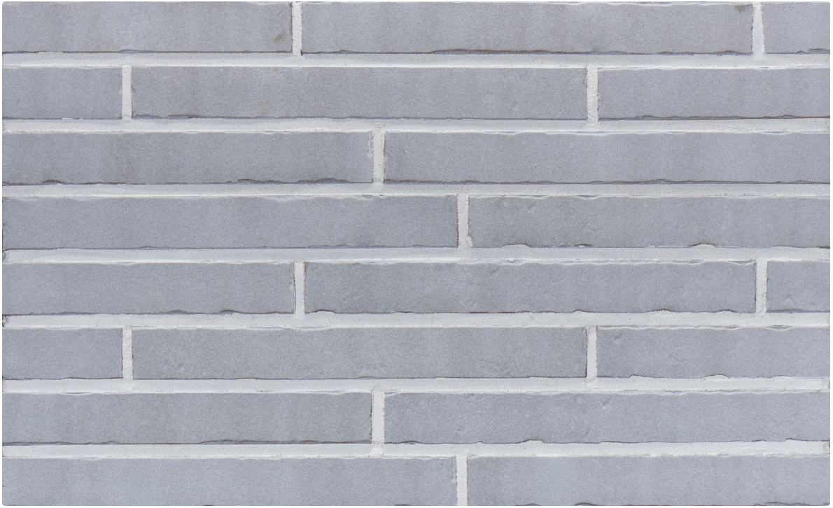 Gray brick wall with alternating brick lengths and white mortar.
