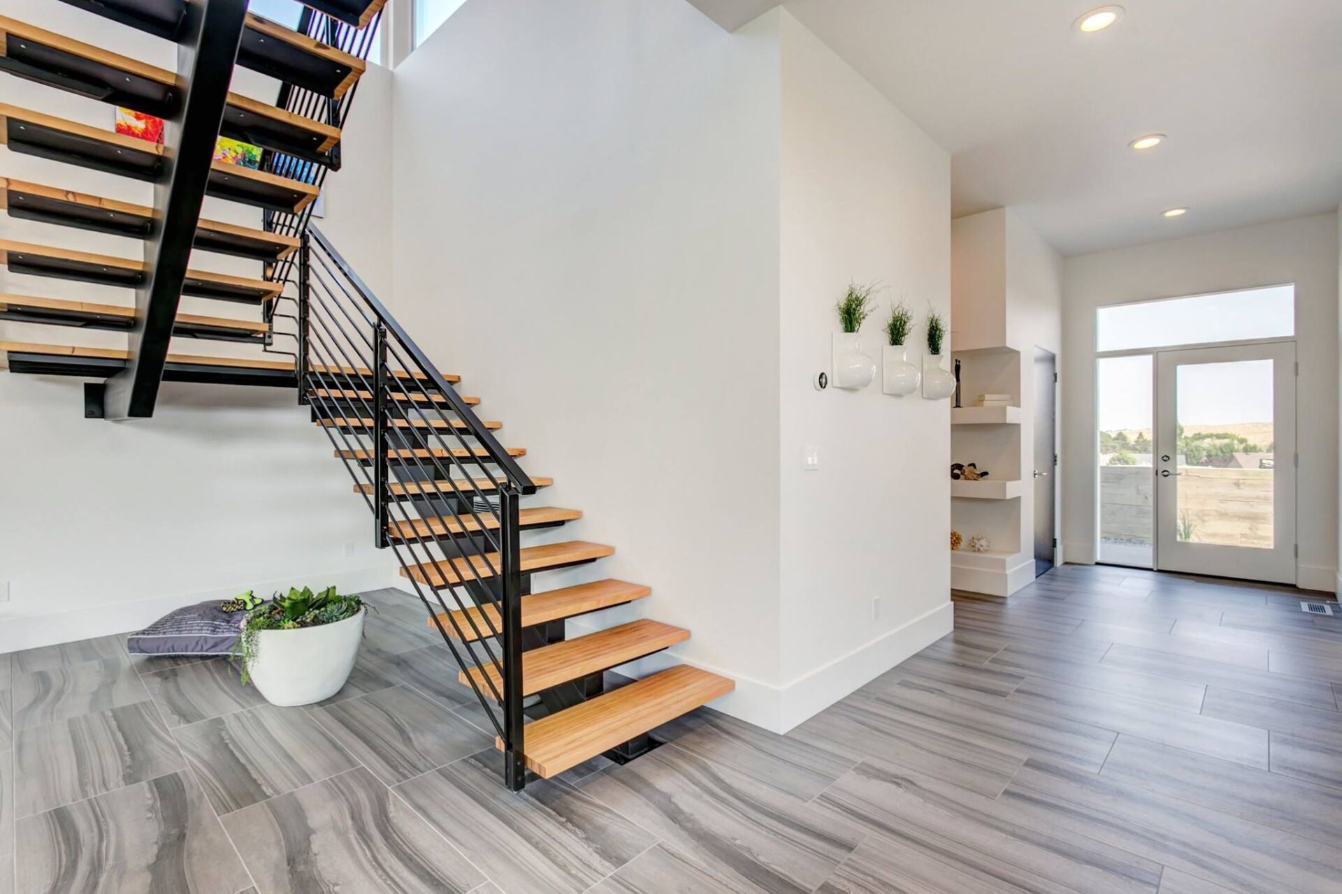 There is a staircase in the middle of the room.