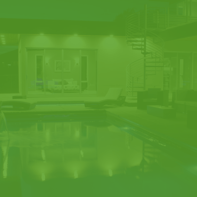A green background with a swimming pool in the middle of a house.