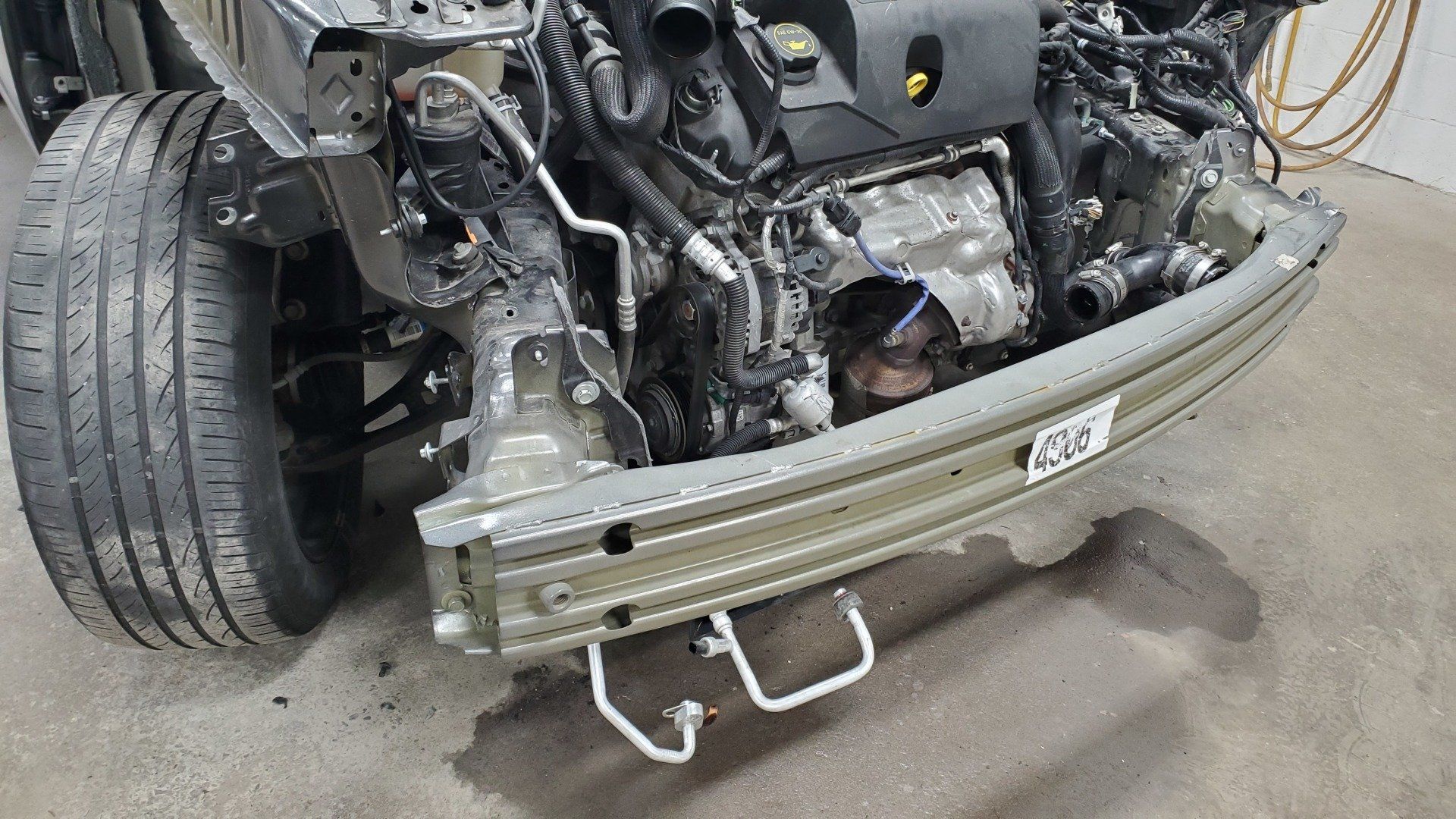 Bent frame rails on SUV at Elmwood Collision