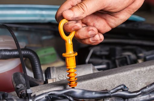 Checking the oil levels of a car