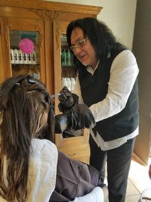 Bang Trim — Stylist Highlighting The Woman's Hair in Albuquerque, NM