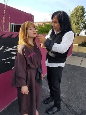 Kids Haircut — Stylist Using A Comb in Albuquerque, NM