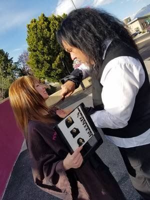 Kids Haircut — Customer Being Happy With Her Hair in Albuquerque, NM