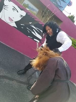 Hair Styling — Stylist Fixing The Woman's Hair in Albuquerque, NM