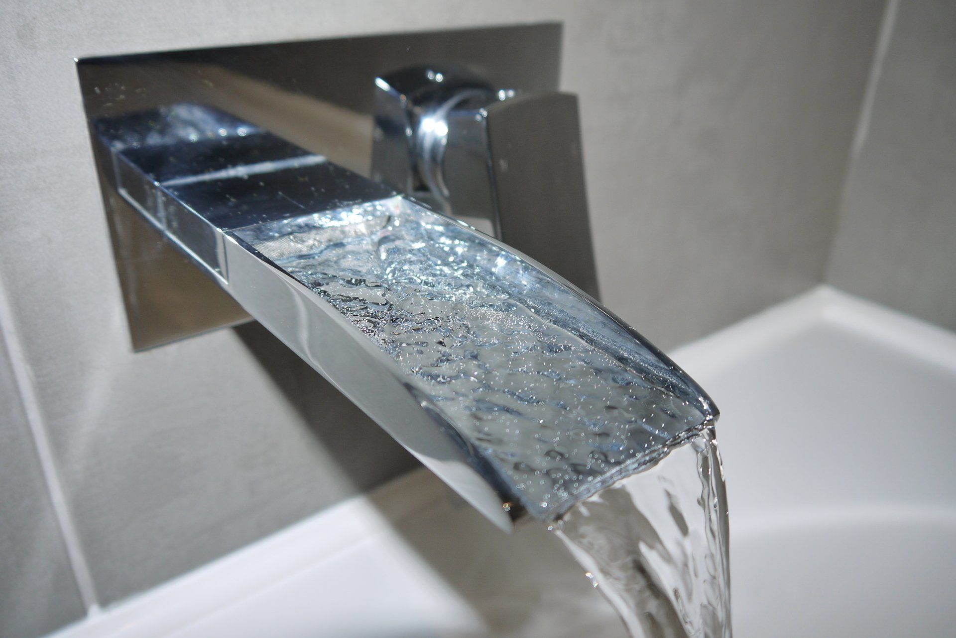 wall mounted bath filler tap grey tile