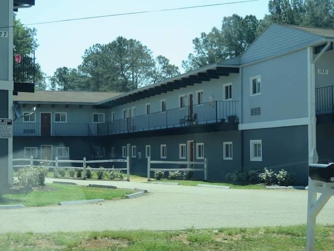 Large, two-story apartment complex with exterior entries