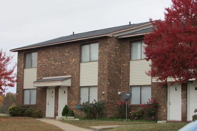 Two-story brick apartment building