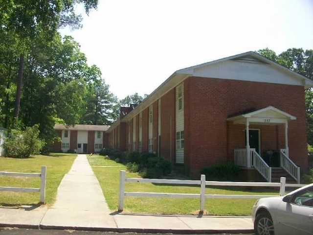 Two-story brick apartment building