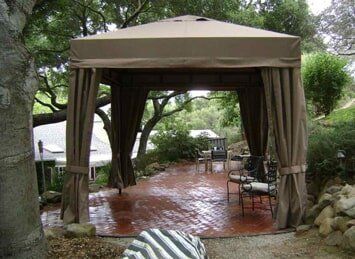 Canvas Awnings — Patio with Brown Awning in Los Angeles, CA Canvas Awnings — Patio with Brown Awning in Los Angeles, CA