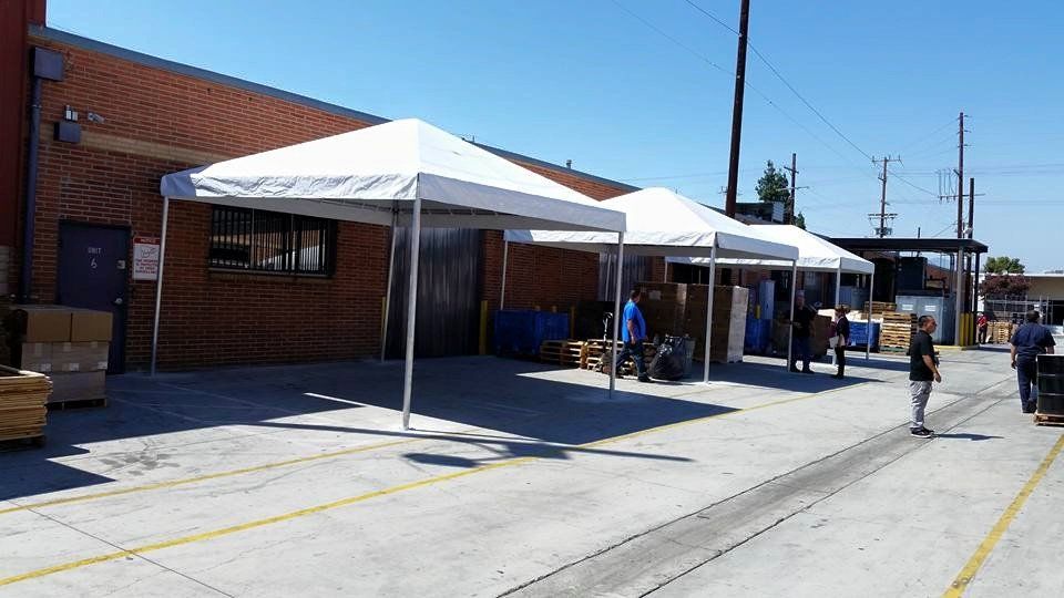 Awnings For Your Storefront — Newly Installed White Canvas in Los Angeles, CA