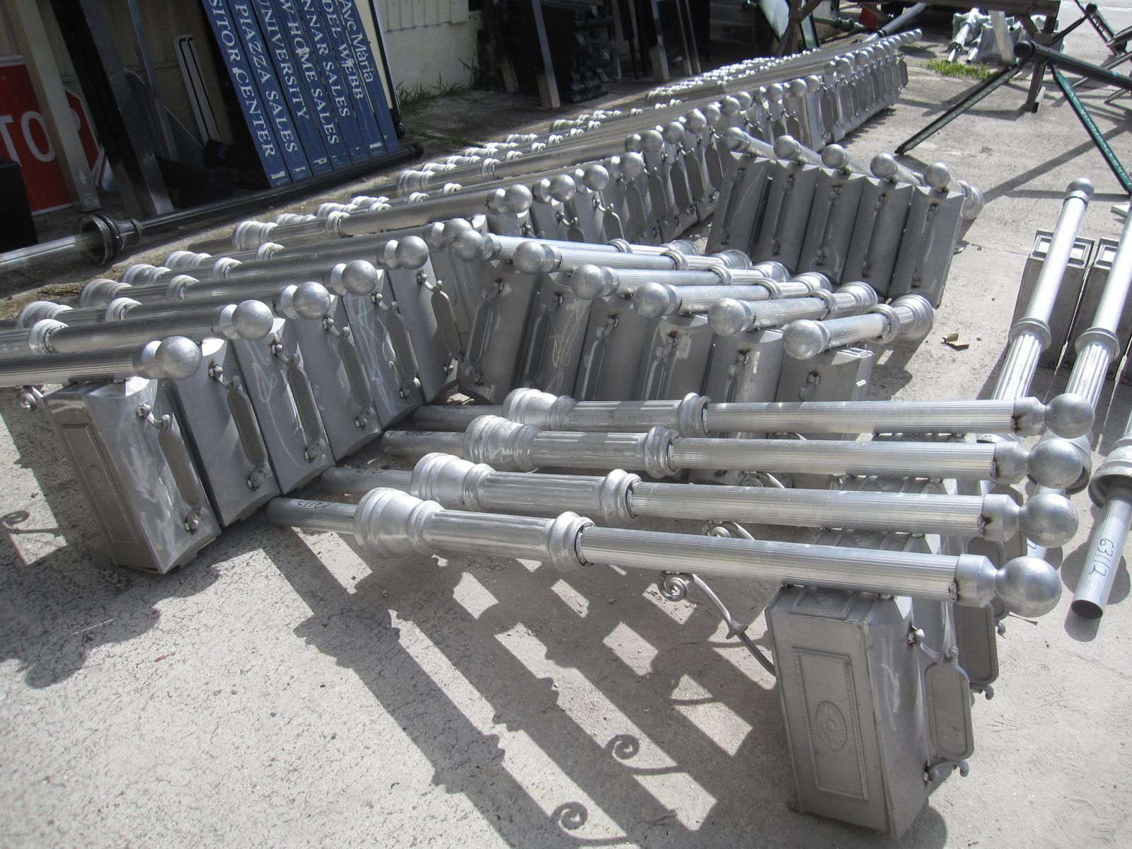 A bunch of metal pipes are stacked on top of each other