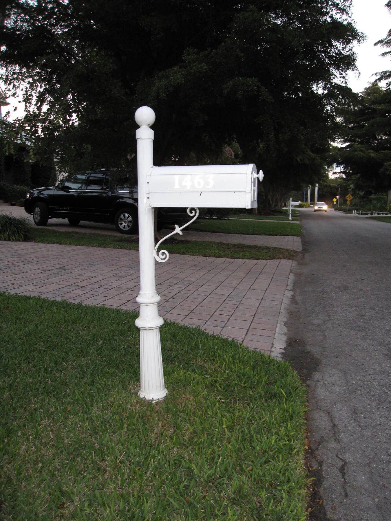 A white aluminum decorative mailbox.