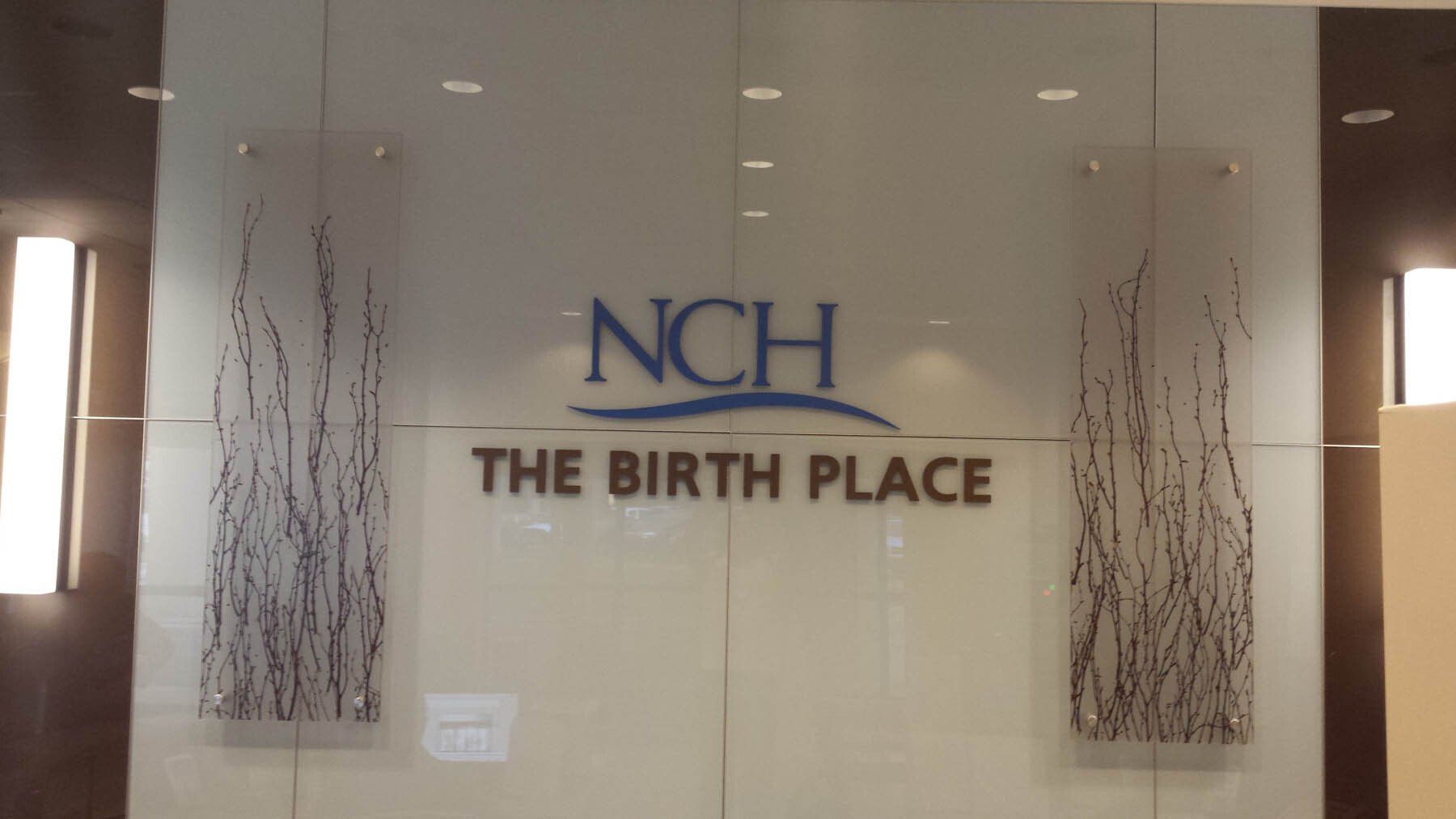 A sign that says nch the birth place on it