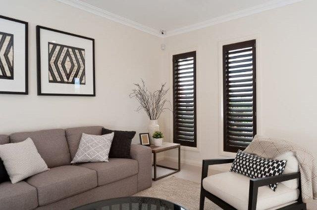 Living Room Vertical Shutter — Drysdale, VIC — Instyle Blinds