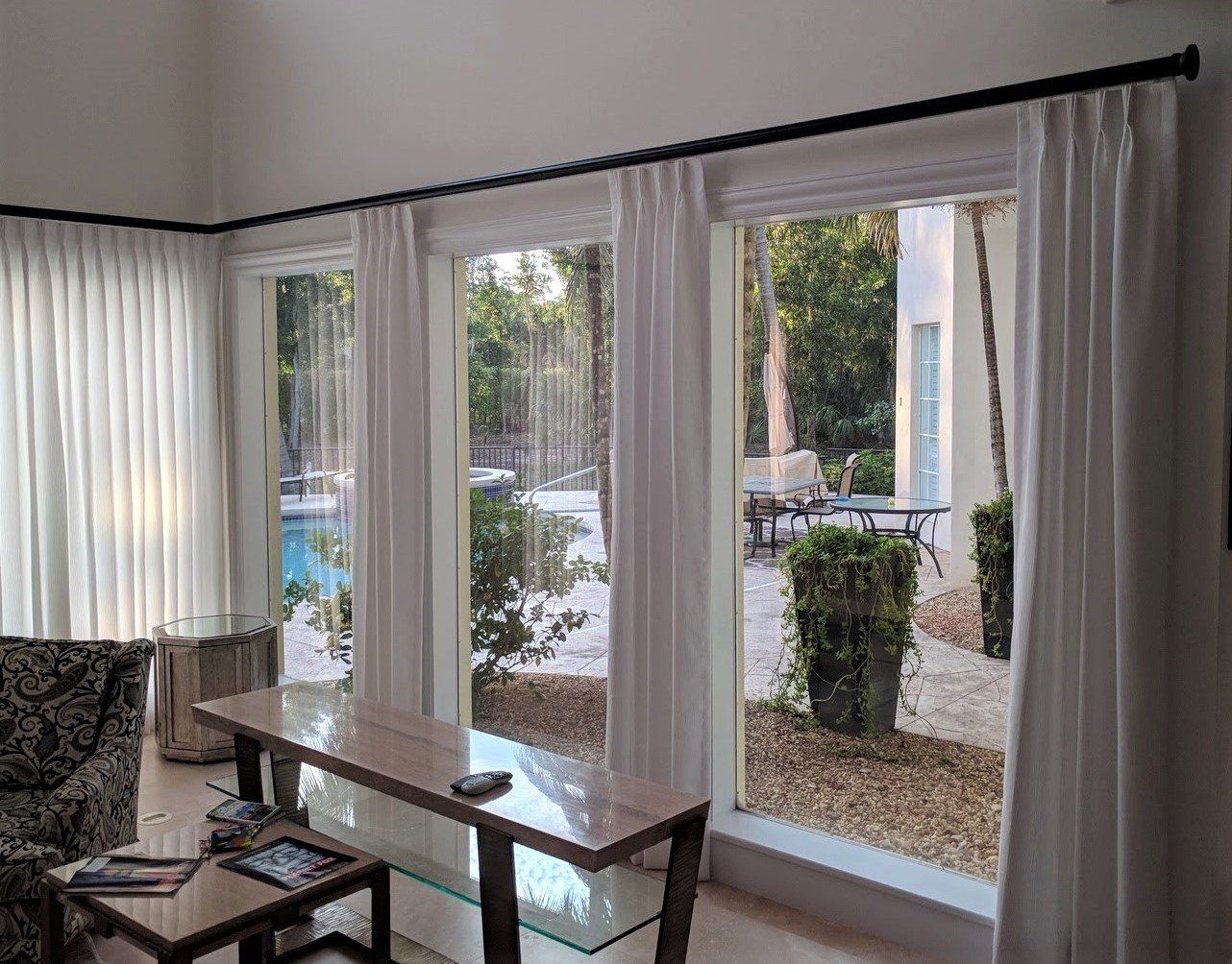 Huge Glass Window With Wood Table — Naples, FL — Home Fashion Upholstery