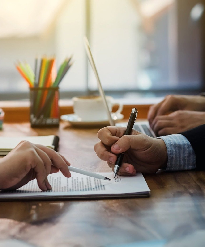 Legal Assistance — Client and Consultant Reading Documents in Bakersfield, CA