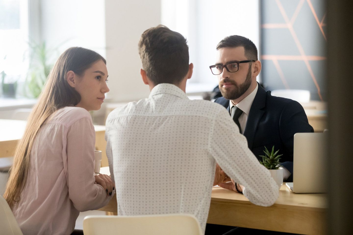Civil Law Documents — Employee Listening to Clients During Consultation in Bakersfield, CA