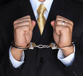 business man in handcuffs