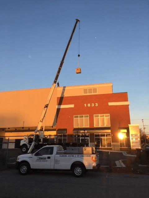 Loading Equipment on the Roof — Annapolis, MD — R E Robertson Plumbing & Heating