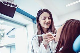hygienists cleaning teeth