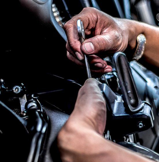 Mechanic Repairing Motorcycle — Motorbike Repairs in Lismore, NSW