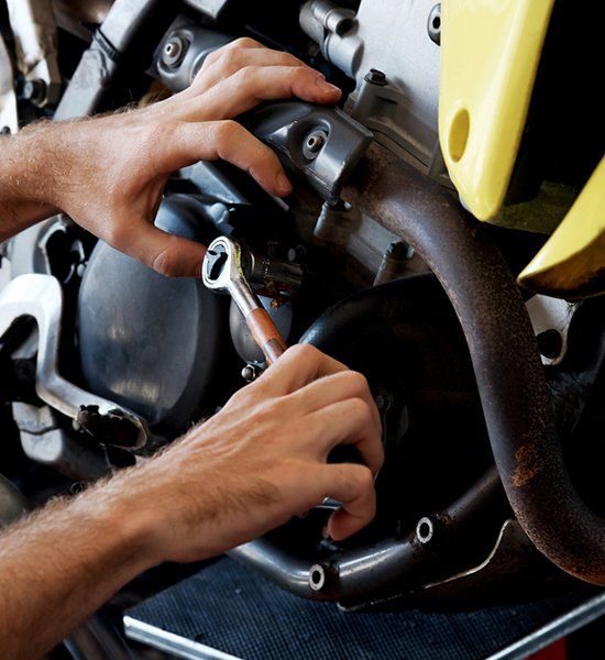 Mechanic Repairing Motorcycle — Motorbike Repairs in Lismore, NSW