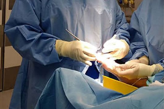 doctor performing foot surgery close up