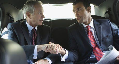 working professionals shaking hands