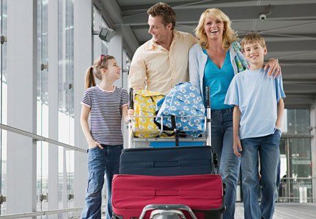 a happy family heading out for a vacation