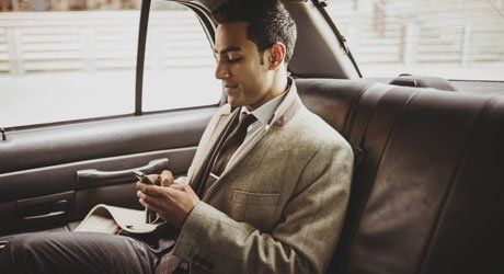 man texting from his mobile phone