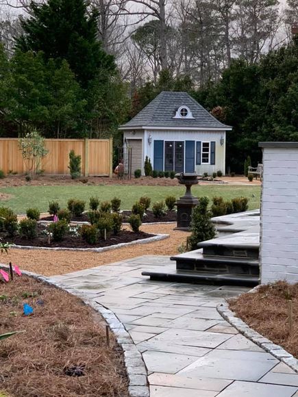 Landscaped Area With Statue In Middle Next To Plants — Virginia Beach, VA — Gentle Rain Landscaped Area With Statue In Middle Next To Plants — Virginia Beach, VA — Gentle Rain