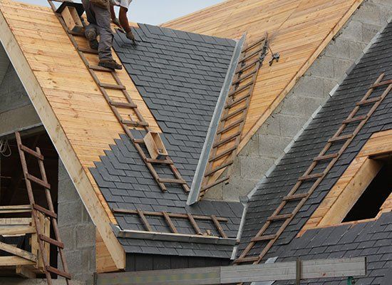 Installing Roof On Modern House — Schenectady, NY — All Seasons Roofing Installing Roof On Modern House — Schenectady, NY — All Seasons Roofing