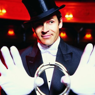 magician holding magic rings