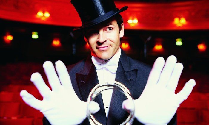 magician holding magical rings