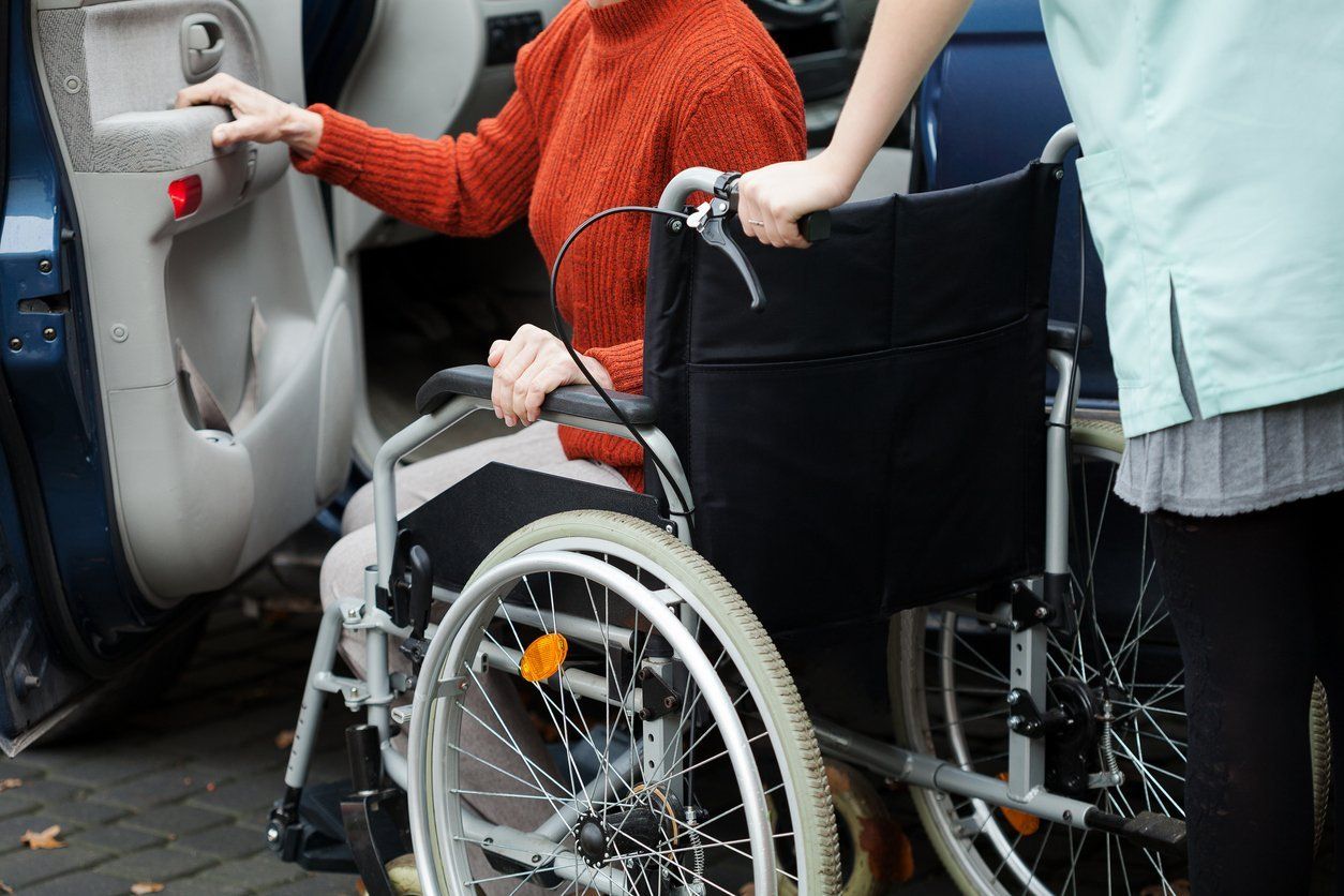 loading patient from wheelchair into vehicle