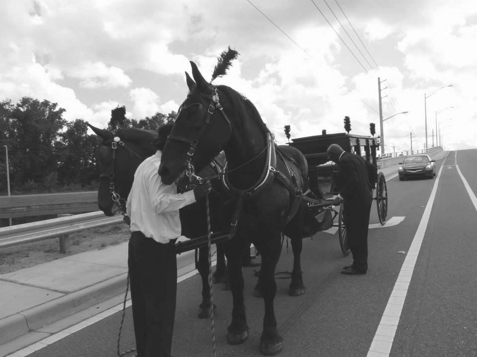 funeral procession horse and buggy