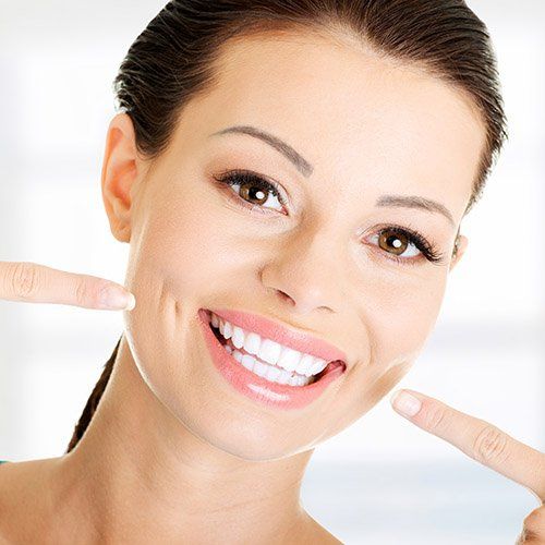 Woman smiling with bright white teeth.