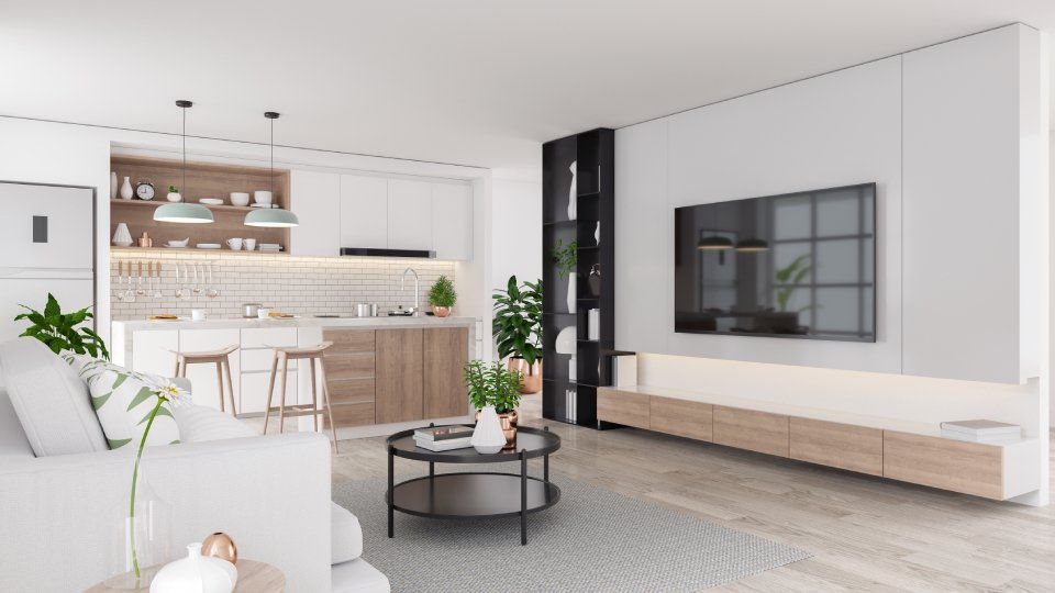 Moderno open space con cucina e soggiorno. Colori neutri, dettagli in legno, TV e piante da interno.